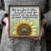 sunflowers-sign-in-hands