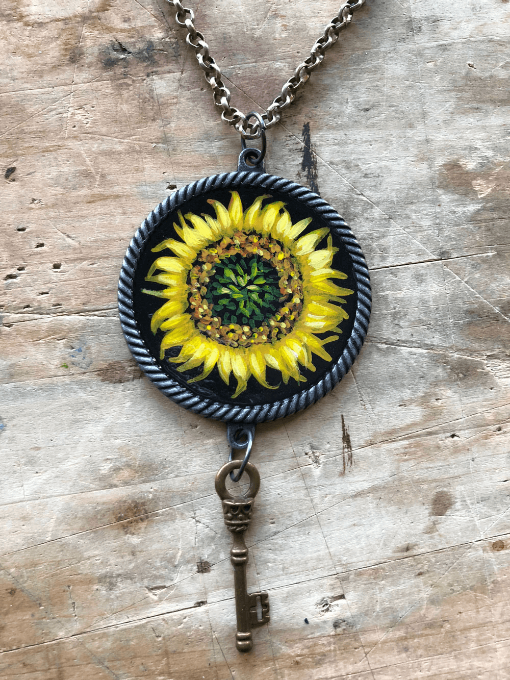 Make a sunflower necklace by learning to paint with acrylic paints!