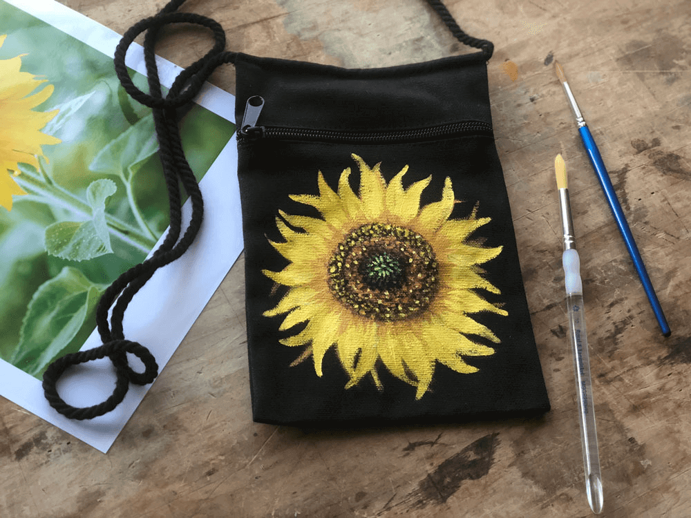 Paint acrylic sunflowers on anything from a bag to a necklace - Skillshare class