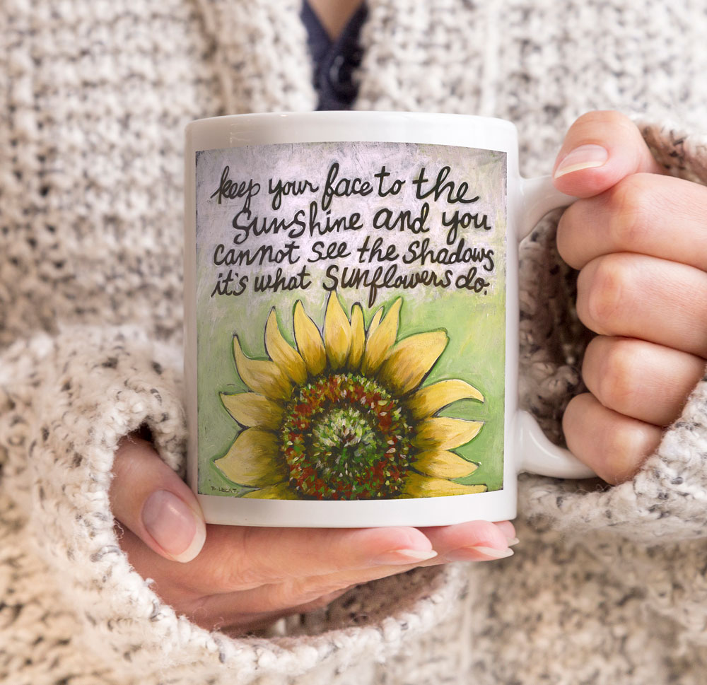 https://bonnielecatdesigns.com/wp-content/uploads/2018/06/sunflowers-mug-handle-right-SQR.jpg